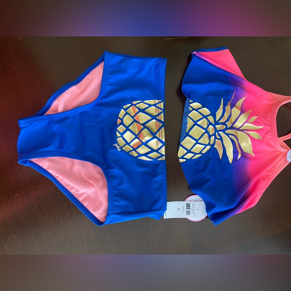 Girls 2pc swimsuit. New with tags and shipping bag